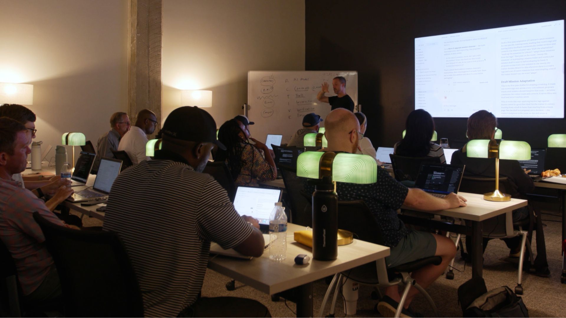 Participants working on their laptops during a Caravan workshop