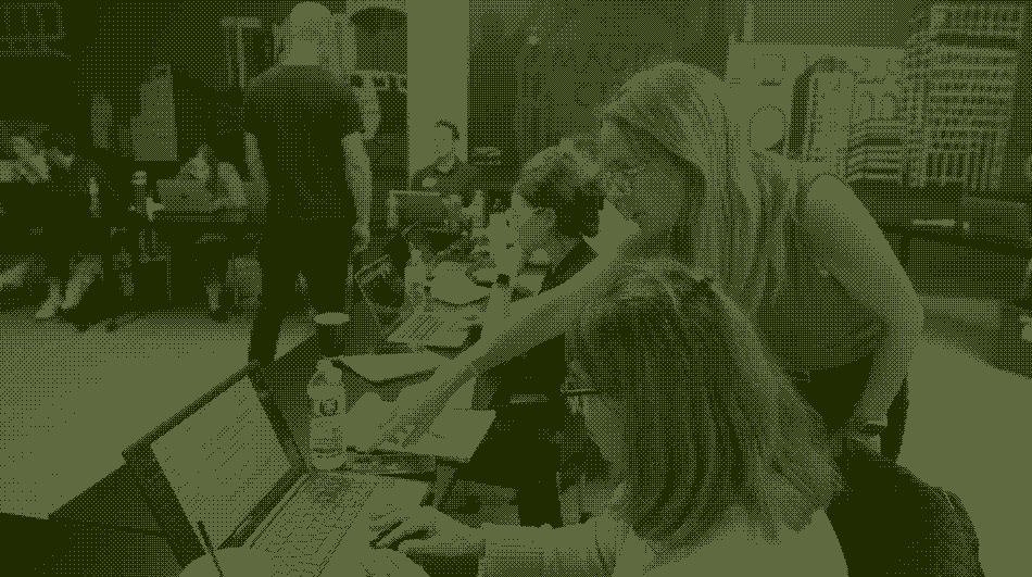 Trainer guiding a student during a Caravan public training session